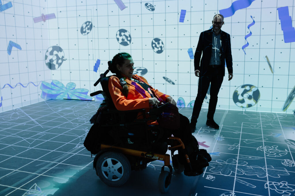 two people enjoying The Museum interactive floor